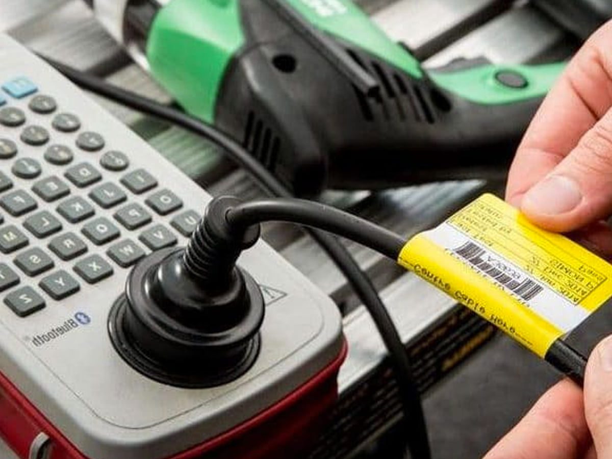 Electrical equipment being tested with safety tag